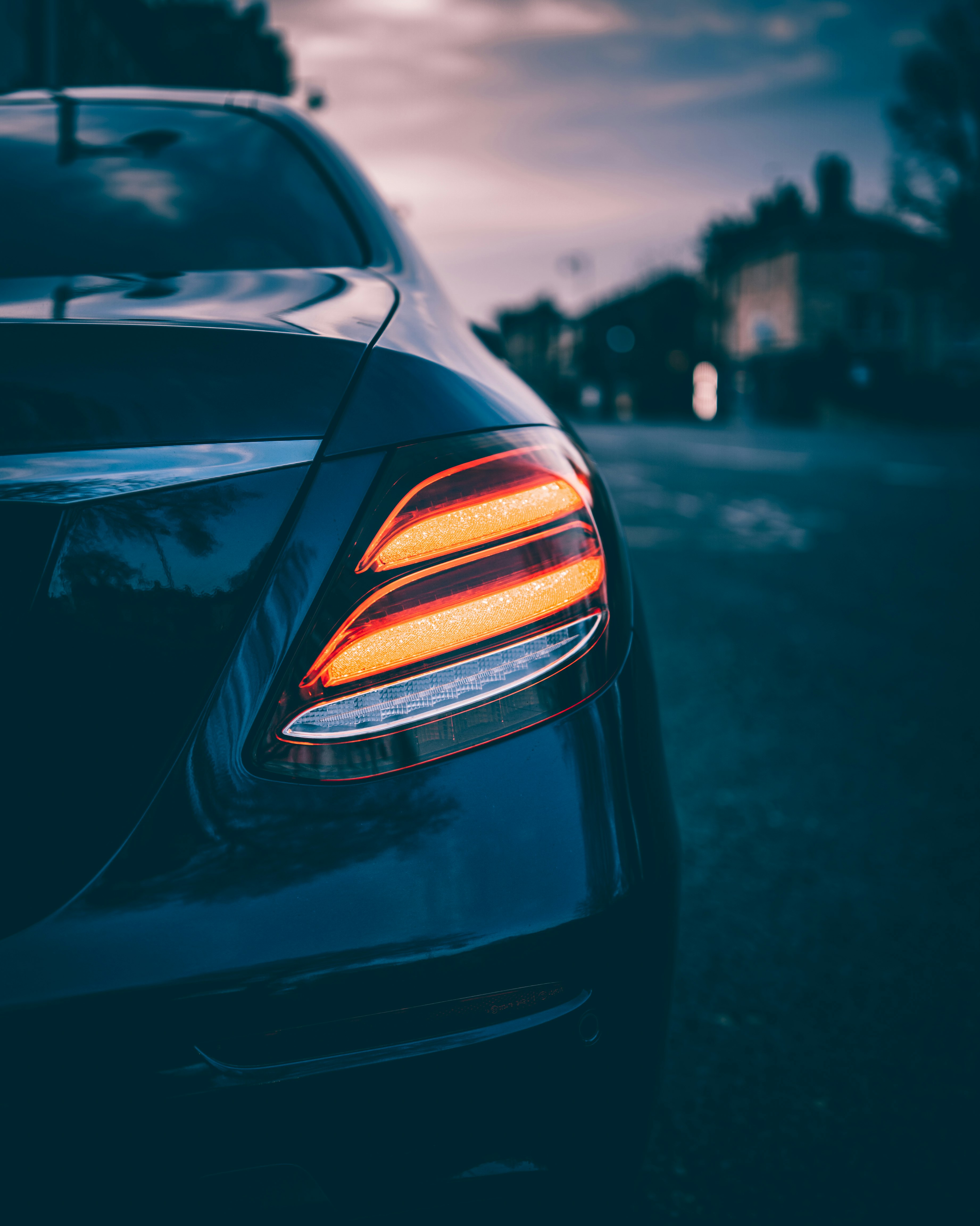 black car on road during night time